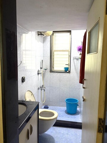 Bathroom in 2 BHK Apartment at Parag Mansion Chs , Andheri West – for Rent