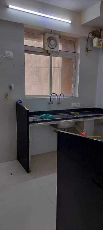 Kitchen in 2 BHK Apartment at Hiranandani Estate, Ghodbunder Road – for Rent