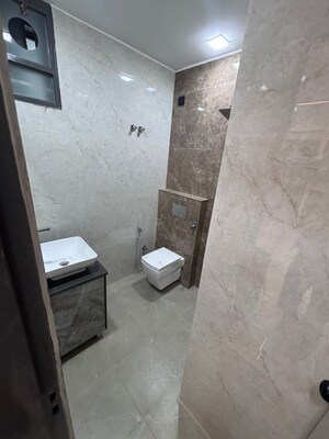 Bathroom in 3.5 BHK Builder Floor at Sahastradhara Road – for Sale