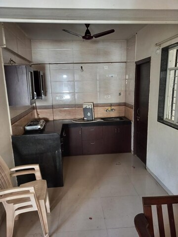 Kitchen in 2 BHK Apartment at Yash Wisteria, Wakad – for Rent