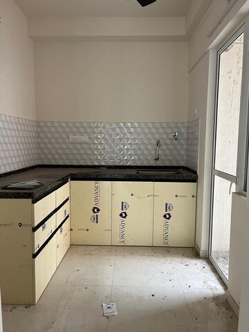 Kitchen in 2 BHK Apartment at Godrej Green Cove, Mahalunge – for Rent