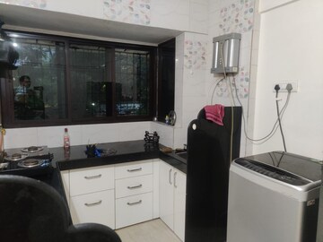 Kitchen in 1 BHK Apartment at Harsiddh Park CHS, Vasant Vihar – for Rent
