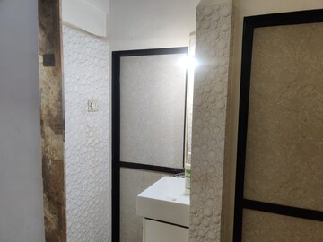 Bathroom in 1 BHK Apartment at Harsiddh Park CHS, Vasant Vihar – for Rent