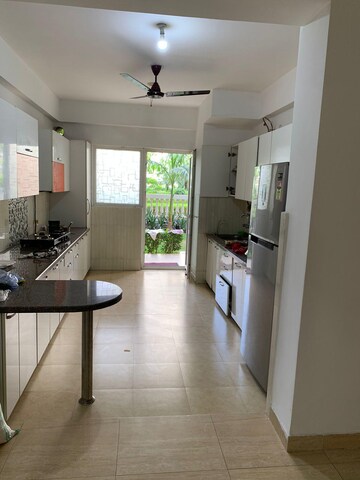 Kitchen in 4 BHK Apartment at Purvanchal Royal City, Chi V Greater Noida – for Rent