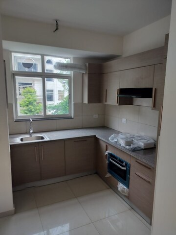 Kitchen in 4 BHK Apartment at Purvanchal Royal City, Chi V Greater Noida – for Rent