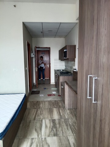 Building Lobby in 1 BHK Apartment at Paramount Golfforeste, Zeta I Greater Noida – for Rent