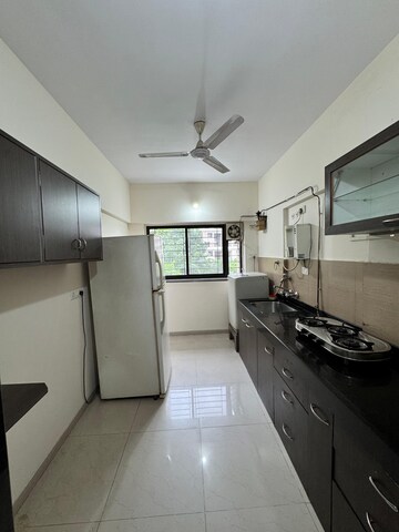 Kitchen in 3 BHK Apartment at Kalpataru Estate, Pimple Gurav – for Rent