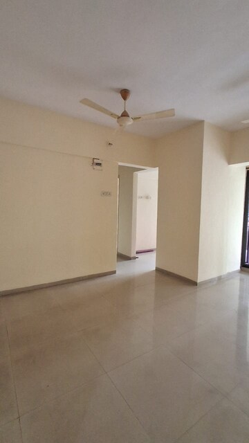 Living Room in 2 BHK Apartment at Yuvraj Bonzer Carnival, Kharghar – for Rent