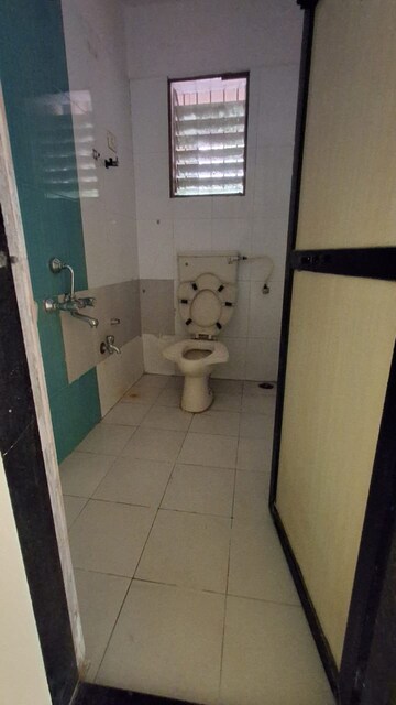 Bathroom in 2 BHK Apartment at Yuvraj Bonzer Carnival, Kharghar – for Rent