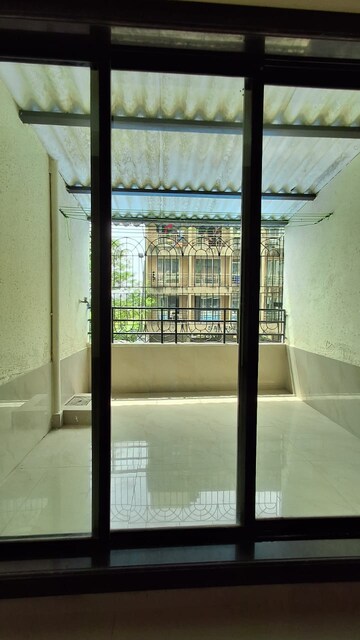 Terrace in 2 BHK Apartment at Yuvraj Bonzer Carnival, Kharghar – for Rent