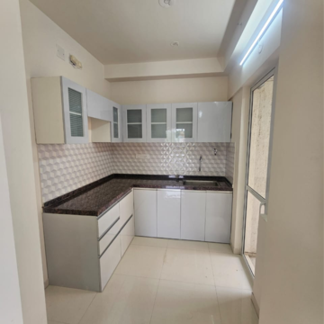 Kitchen in 2 BHK Apartment at Godrej Green Cove, Bhoirwadi – for Rent