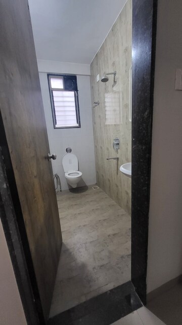 Bathroom in 2 BHK Apartment at Royal Orchid Mohan Nagar, Baner – for Rent