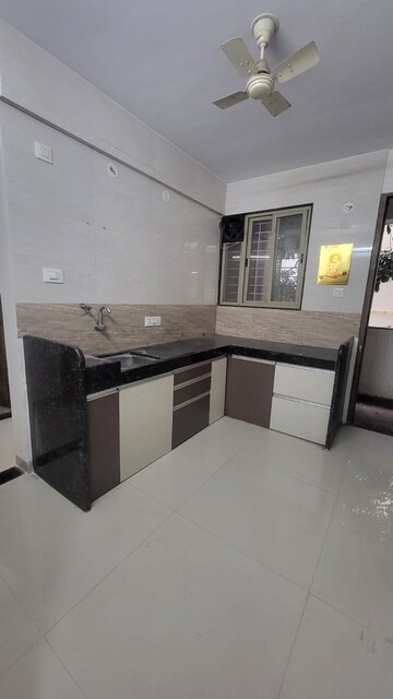 Kitchen in 2 BHK Apartment at Royal Orchid Mohan Nagar, Baner – for Rent
