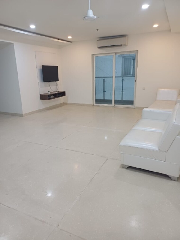 Living Room, golf-edge 4 Bedroom 3434 Sq.Ft. Apartment In Gachibowli Hyderabad 9026778