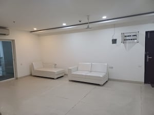 Living Room in 4 BHK Apartment at Golf Edge, Gachibowli – for Sale