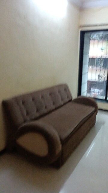 Living Room in 1 BHK Apartment at Shruti CHS, Kandivali West – for Rent