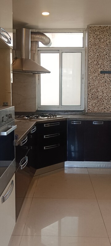 Kitchen in 3.5 BHK Apartment at Shiv Shankar Society, Sector 51 – for Rent