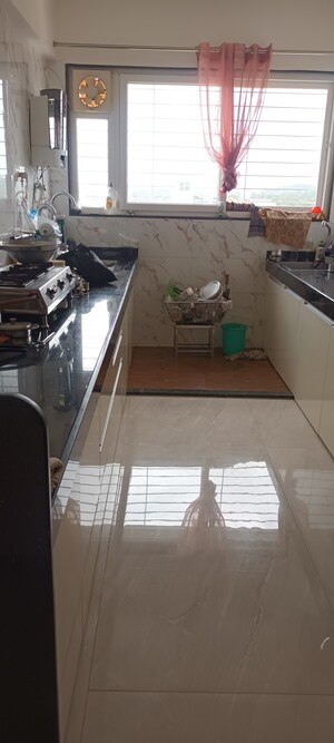 Kitchen in 2 BHK Apartment at D And T Rajkamal Park CHS, Aundh – for Sale