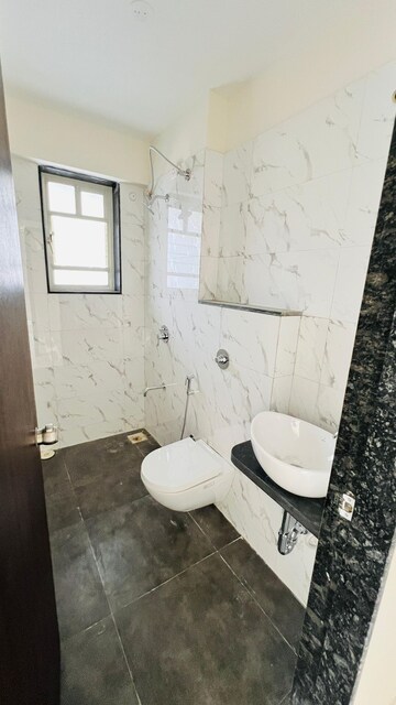 Bathroom in 3 BHK Apartment at Basil Mondale, Mundhwa – for Rent