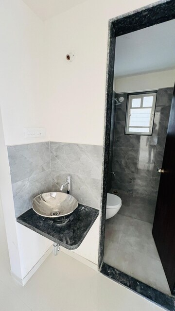 Bathroom in 3 BHK Apartment at Basil Mondale, Mundhwa – for Rent