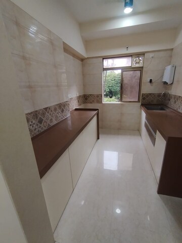 Kitchen in 3 BHK Apartment at Vardhman Grandeur, Andheri West – for Rent
