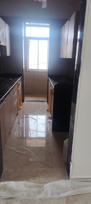 Kitchen in 2 BHK Apartment at Lashkaria Indrasukh, Andheri West – for Sale