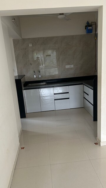 Kitchen in 2 BHK Apartment at Millennium Acropolis, Wakad – for Sale