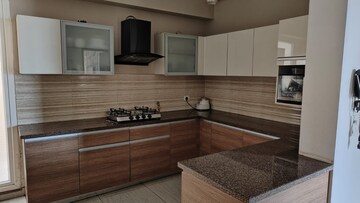 Kitchen in 3 BHK Apartment at ABA Cleo County, Sector 121 – for Rent