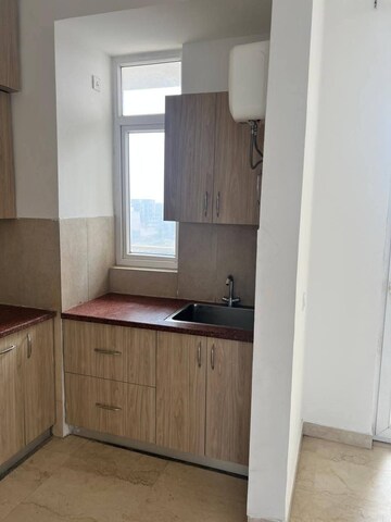 Kitchen in 3 BHK Apartment at Godrej Meridien, Sector 106 – for Rent