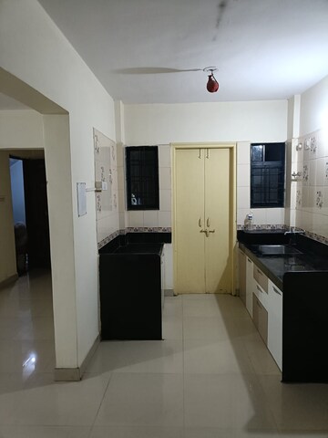 Kitchen in 2 BHK Apartment at Aatithya Avenue, Pimple Saudagar – for Rent