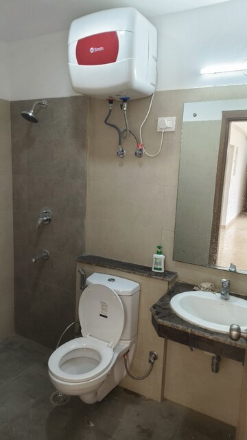 Bathroom in 3 BHK Apartment at ATS Homekraft Pious Hideaways, Sector 150 – for Rent