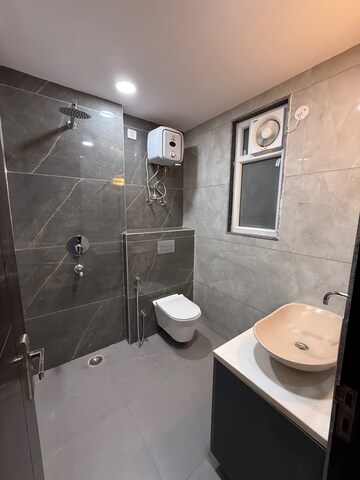 Bathroom in 3 BHK Builder Floor at Ansal API Esencia, Sector 67 – for Sale