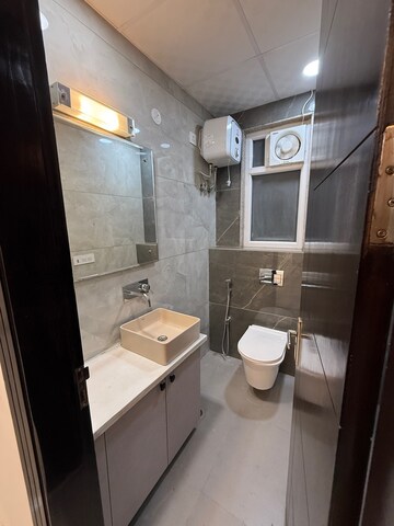 Bathroom in 3 BHK Builder Floor at Ansal API Esencia, Sector 67 – for Sale