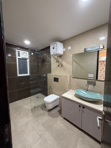 Bathroom in 3 BHK Builder Floor at Ansal API Esencia, Sector 67 – for Sale