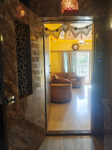 Living Room in 2 BHK Apartment at Siddhi Highland Haven, Balkum Pada – for Rent