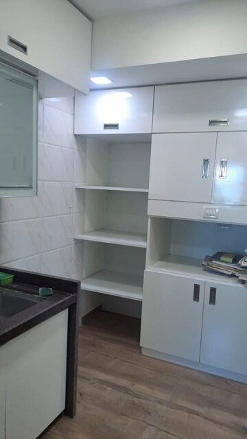 Kitchen in 3 BHK Apartment at Hiranandani Estate Penrose, Thane West – for Rent