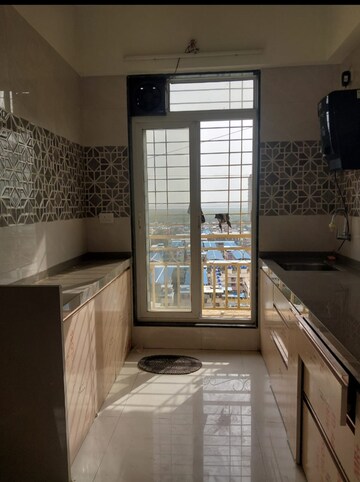 Kitchen in 2 BHK Apartment at Shakti Aura, Ghansoli – for Sale