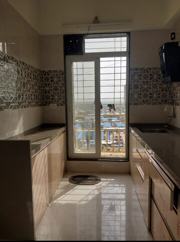 Kitchen in 2 BHK Apartment at Shakti Aura, Ghansoli – for Sale