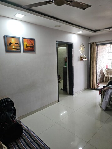 Living Room in 1 BHK Apartment at Happy Valley, Manpada – for Sale