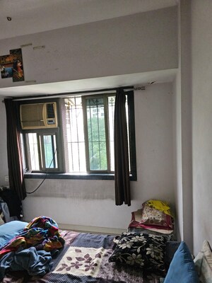 Bedroom in 1 BHK Apartment at Happy Valley, Manpada – for Sale