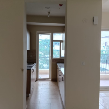 Kitchen in 3 BHK Apartment at Amrapali Crystal Homes, Sector 76 – for Rent