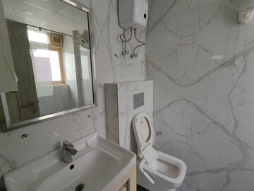 Bathroom in 4 BHK Apartment at New Shivalik Society, Sector 51 – for Rent