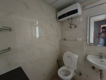 Bathroom in 4 BHK Apartment at New Shivalik Society, Sector 51 – for Rent
