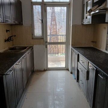 Kitchen in 3 BHK Apartment at Prateek Wisteria, Sector 77 – for Rent