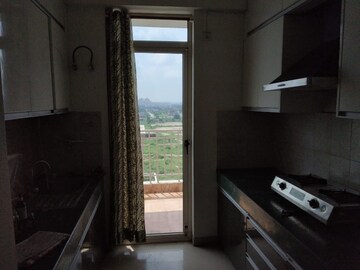 Kitchen in 2 BHK Apartment at Puri Pratham, Sector 84 – for Rent
