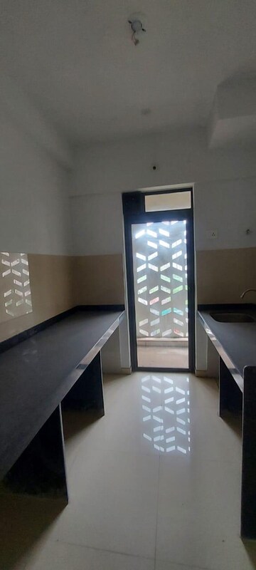 Kitchen in 1.5 BHK Apartment at Lodha Palava City Lakeshore Greens, Dombivli East – for Rent