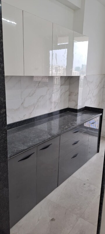 Kitchen in 2 BHK Apartment at Dev Leo Tower, Oshiwara – for Rent