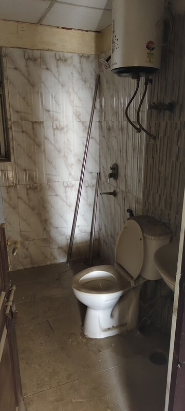 Bathroom in 4 BHK Apartment at Amrapali Crystal Homes, Sector 76 – for Sale