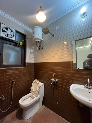 Bathroom in 2 BHK Apartment at Freedom Fighters Enclave – for Rent