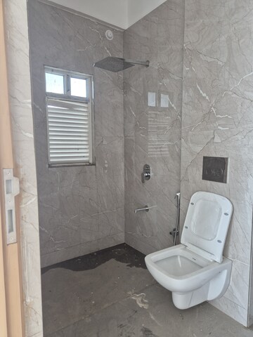 Bathroom in 2 BHK Apartment at Ruparel Iris, Matunga West – for Sale